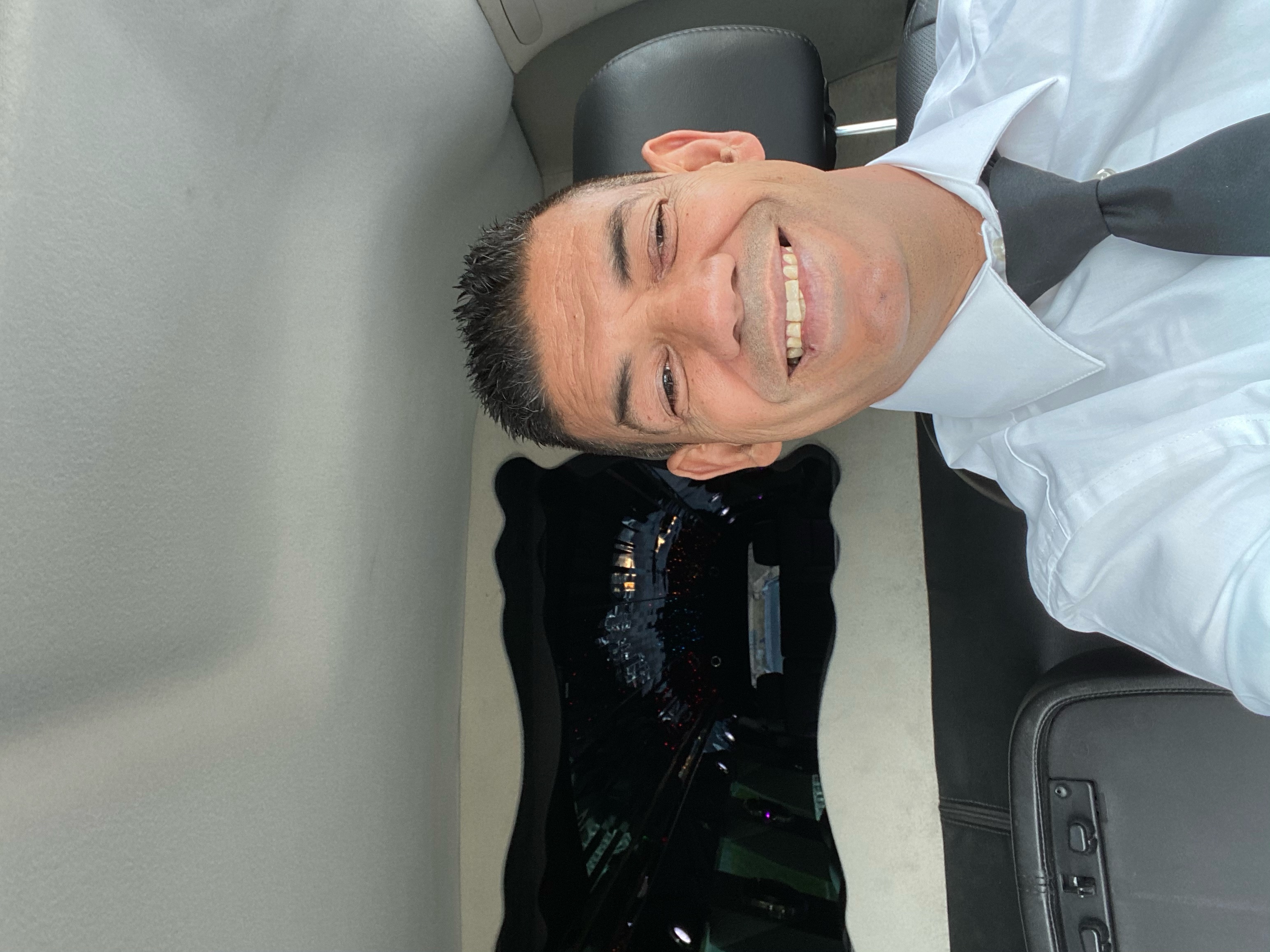 My Husband Driss getting ready to drive a Cadillac Stretch Limousine